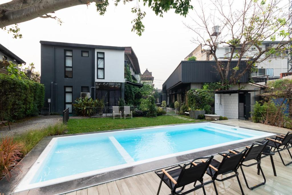 Saltwater swimming pool and modern building at the Chiang Mai complex