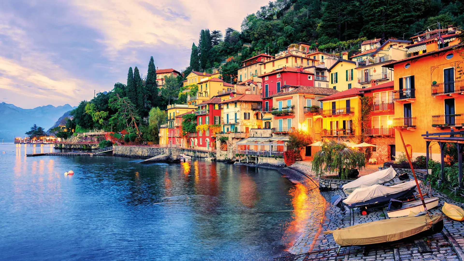 Lake Como, Italy at sunset with colorful buildings