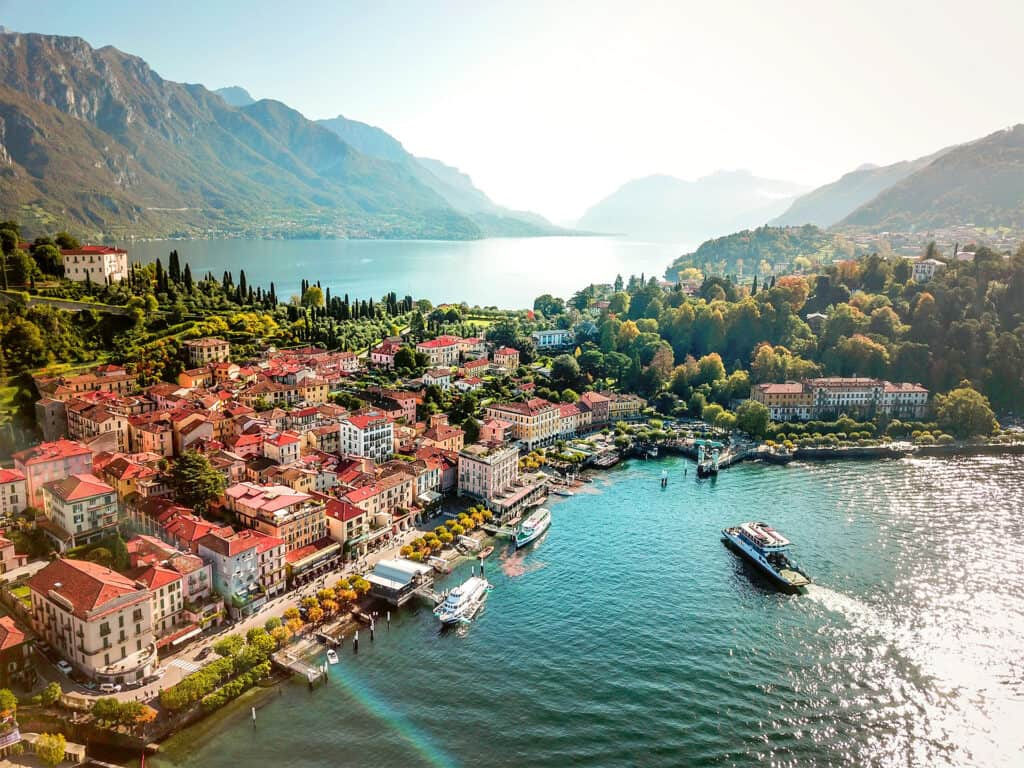 Aerial view of Lake Como town with mountains and turquoise water